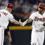 Arizona Diamondbacks' Chris Young, right, shakes hands with coach Matt Williams (9) as he rounds the bases after hitting a home run against the Arizona Diamondbacks during the fourth inning of a baseball game Thursday, June 16, 2011, in Phoenix. (AP Photo/Ross D. Franklin)