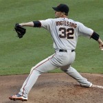 San Francisco Giants' Ryan Vogelsong throws to the Arizona Diamondbacks during the first inning of a baseball game Thursday, June 16, 2011, in Phoenix. (AP Photo/Ross D. Franklin)