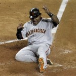San Francisco Giants' Pablo Sandoval shouts in celebration as he scores a run against the Arizona Diamondbacks during the ninth inning of an MLB baseball game Thursday, June 16, 2011, in Phoenix. (AP Photo/Ross D. Franklin)