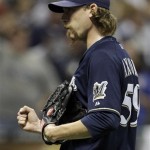 Milwaukee Brewers relief pitcher John Axford reacts after getting Arizona Diamondbacks' Paul Goldschmidt to strike out and end the ninth inning of Game 2 of baseball's National League division series Sunday, Oct. 2, 2011, in Milwaukee. The Brewers won the game 9-4 to take a 2-0 lead in the series. (AP Photo/David J. Phillip)