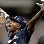 Milwaukee Brewers' Nyjer Morgan reacts after hitting a two-run scoring single during the sixth inning of Game 2 of baseball's National League division series against the Arizona Diamondbacks Sunday, Oct. 2, 2011, in Milwaukee. (AP Photo/David J. Phillip)