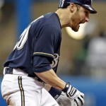 Milwaukee Brewers' Jonathan Lucroy reacts after his RBI bunt during the sixth inning of Game 2 of baseball's National League division series against the Arizona Diamondbacks Sunday, Oct. 2, 2011, in Milwaukee. (AP Photo/Jeffrey Phelps)
