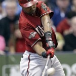 Arizona Diamondbacks' Chris Young hits a home run during the fourth inning of Game 2 of baseball's National League division series against the Milwaukee Brewers Sunday, Oct. 2, 2011, in Milwaukee. (AP Photo/David J. Phillip)
