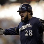 Milwaukee Brewers' Prince Fielder reacts after hitting an RBI single during the third inning of Game 2 of baseball's National League division series against the Arizona Diamondbacks Sunday, Oct. 2, 2011, in Milwaukee. (AP Photo/David J. Phillip)
