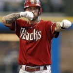 Arizona Diamondbacks' Ryan Roberts reacts after hitting a double during the second inning of Game 2 of baseball's National League division series against the Milwaukee Brewers Sunday, Oct. 2, 2011, in Milwaukee. (AP Photo/Jeffrey Phelps)
