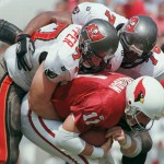 6. Kent Graham - Graham only posted a 5-9 record as a starter over two seasons with the Cardinals...let's face it, he was keeping the seat warm for Jake Plummer. But the Ohio State product did throw two td passes in an upset win over the Cowboys in 1997 that caused Cardinal fans to rip down the Sun Devil Stadium goalposts and carry them down Mill Avenue. (AP Photo)
