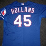 Derek Holland, current pitcher for the Texas 
Rangers - $500