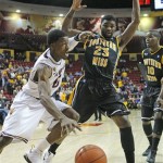 Arizona State's Carrick Felix drives to the paint against Southern Miss's Angelo Johnson during the first half of their NCAA basketball game Monday, Dec. 19, 2011 in Tempe. (AP Photo/Arizona Republic, David Kadlubowski)