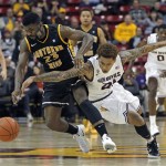 Arizona State's Keala King and Southern Miss's Angelo Johnson battle for a loose ball during the first half of their NCAA basketball game Monday, Dec. 19, 2011 in Tempe. (AP Photo/Arizona Republic, David Kadlubowski)