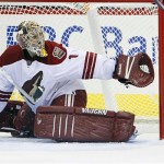 Phoenix Coyotes goalie Jason LaBarbera (1) send the puck wide of the net during the first period of an NHL hockey game against the Carolina Hurricanes in Raleigh, N.C., Wednesday, Dec. 21, 2011. LaBarbera had 34 saves in the Coyotes 4-3 win.(AP Photo/Karl B DeBlaker)