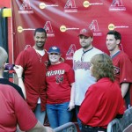 D-backs CF Chris Young and RP Craig Breslow pose with some fans at 
2012 Subway FanFest. (Photo by Vince Marotta/Arizona Sports)