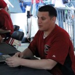 Relief pitcher David Hernandez signs autographs at the 2012 Subway 
FanFest. (Photo by Vince Marotta/Arizona Sports)