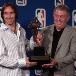 Phoenix Suns chairman and CEO Jerry Colangelo, right, presents Suns guard Steve Nash, left, of Canada, with the NBA's Most Valuable Player Award for the 2004-05 season at a press conference at America West Arena in Phoenix Sunday, May 8, 2005. (AP Photo/Tom Hood)