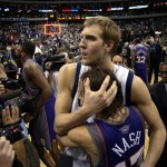 Dallas Mavericks forward Dirk Nowitzki (41) hugs Phoenix Suns' Steve Nash (13) after Phoenix defeated Dallas 130-126 in overtime in Dallas on Friday, May 20, 2005. Phoenix won the series 4-2, advancing to the Western Conference finals. (AP Photo/Tony Gutierrez)