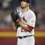 St. Louis Cardinals pitch Kyle Lohse reacts 
after giving up an RBI single to Arizona 
Diamondbacks' Wade Miley in the second inning 
of a baseball game Wednesday, May 9, 2012, in 
Phoenix. (AP Photo/Paul Connors)
