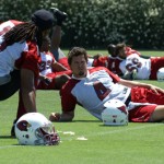 Larry Fitzgerald and Kevin Kolb chat before Day 
2 of Cardinals OTAs. (Adam Green/Arizona 
Sports)
