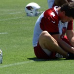Kevin Kolb stretches before Day 2 of Cardinals 
OTAs. (Adam Green/Arizona Sports)