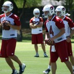 Cardinals QBs Kevin Kolb and John Skelton get 
ready to snap the ball during OTAs Thursday. 
(Photo by Adam Green/Arizona Sports)