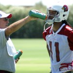 Larry Fitzgerald has a drink during OTAs 
Thursday. (Photo by Adam Green/Arizona Sports)