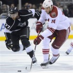 Phoenix Coyotes left wing Taylor Pyatt, right, 
skates past Los Angeles Kings center Jeff 
Carter during the first period of Game 3 of the 
NHL hockey Stanley Cup Western Conference 
finals, Thursday, May 17, 2012, in Los Angeles. 
(AP Photo/Mark J. Terrill)