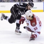 Los Angeles Kings defenseman Drew Doughty, 
left, knocks Phoenix Coyotes center Antoine 
Vermette off his skates during the third period 
of Game 3 of the NHL hockey Stanley Cup Western 
Conference finals, Thursday, May 17, 2012, in 
Los Angeles. The Kings won 2-1. (AP Photo/Mark 
J. Terrill)