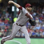 Arizona Diamondbacks starting pitcher Ian Kennedy throws during the first inning of a baseball game against the Texas Rangers, Tuesday, June 12, 2012, in Arlington, Texas. (AP Photo/LM Otero)