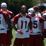 Larry Fitzgerald leads his team during morning 
minicamp Wednesday, June 13. (Craig 
Grialou/Arizona Sports)