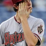 Arizona Diamondbacks' Trevor Bauer pauses to 
wipe his face after allowing a score by the 
Atlanta Braves during the third inning of a 
baseball game, Thursday, June 28, 2012, in 
Atlanta. (AP Photo/John Amis)