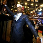 Florida State center Bernard James shakes 
spectators' hands moments after being picked 
with the third pick in the second round by the 
Cleveland Cavaliers during the NBA basketball 
draft, Thursday, June 28, 2012, in Newark, 
N.J. (AP Photo/Julio Cortez)