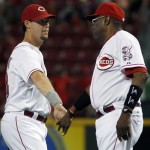 Cincinnati Reds' Ryan Ludwick, left, gets 
congratulated by manager Dusty Baker after the 
Reds defeated the Arizona Diamondback 4-0 in a 
baseball game in Cincinnati, Tuesday, July 17, 
2012. (AP Photo/Tom Uhlman)