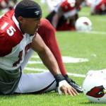 Michael Floyd stretches prior to practice at 
Cardinals training camp Saturday, July 28. 
(Adam Green/Arizona Sports)