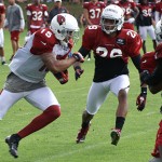 Michael Floyd turns up the field during training camp in Flagstaff on 
July 31, 2012. (Adam Green/Arizona Sports)
