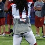 Larry Fitzgerald catches a pass during the team's annual night practice 
at Lumberjack Stadium on August 1, 2012. (Adam Green/Arizona 
Sports)