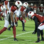 Larry Fitzgerald and Patrick Peterson line up during the team's annual 
night practice at Lumberjack Stadium on August 1, 2012. (Adam 
Green/Arizona Sports)