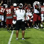 Defensive coordinator Ray Horton watches as the Cardinals defense 
reacts to recovering a fumble during the team's annual night practice 
at Lumberjack Stadium on August 1, 2012. (Adam Green/Arizona 
Sports)
