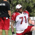Offensive lineman Daryn Colledge soaks in coach's instruction during Cardinals training camp in Flagstaff Thursday, August 14. (Photo: Vince Marotta/Arizona Sports)