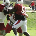 Defensive tackle Nick Eason (98) and offensive lineman Adam Snyder tangle during Cardinals training camp in Flagstaff Thursday, August 14. (Photo: Vince Marotta/Arizona Sports)