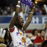 Robyn Smith, sister of Phoenix Mercury center Tangela Smith, cheers the Mercury during the WNBA Finals against the Detroit Shock at the Palace of Auburn Hills, Mich., Sunday, Sept. 16, 2007. (AP Photo/Gary Malerba)