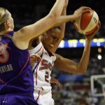Detroit Shock forward Plenette Pierson, right,defended by Phoenix Mercury forward Penny Taylor, left, pulls down a rebound during the second quarter of the WNBA Finals at the Palace of Auburn Hills, Mich., Sunday, Sept. 16, 2007. (AP Photo/Gary Malerba)