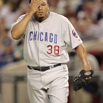 Chicago Cubs pitcher Carlos Zambrano wipes his forehead during the fourth inning against the Arizona Diamondbacks in Game 1. AP Photo/Matt York
