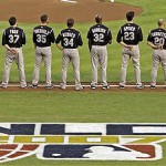 The Colorado Rockies line up for the National Anthem before the start of Game 1 of the National League Championship baseball series against the Arizona Diamondbacks. (AP Photo/Ross D. Franklin)