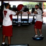 Anthony Sherman prepares to receive the medicine ball during an offseason workout in Tempe on April 3, 2013. (Craig Grialou/Arizona Sports)