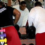 Defensive linemen Calais Campbell and Dan Williams lift weights during an offseason workout in Tempe on April 3, 2013. (Craig Grialou/Arizona Sports)
