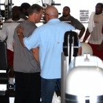 Head coach Bruce Arians chats with John Lott during an offseason workout in Tempe on April 3, 2013. (Craig Grialou/Arizona Sports)