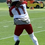 Receiver Larry Fitzgerald catches a pass during Arizona Cardinals OTAs on Tuesday, May 14 at the team's Tempe training facility. (Adam Green/Arizona Sports)