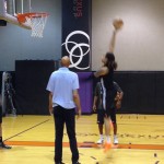 Phoenix Mercury rookie Brittney Griner shoots a sky hook while Kareem Abdul-Jabbar watches at practice on Wednesday, May 15 at the US Airways Center. (Craig Grialou/Arizona Sports)