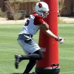 Receiver Michael Floyd runs through a drill during OTAs on May 21, 2013 at the team's Tempe training facility. (Adam Green/Arizona Sports)