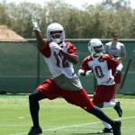 Receiver Andre Roberts reaches for an overthrown pass during Arizona Cardinals OTAs on Thursday, June 6, 2013. (Adam Green/Arizona Sports)