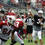 Quarterback Carson Palmer throws a pass to tight end Rob Housler during the Cardinals' Red & White Practice Saturday, August 3 at University of Phoenix Stadium in Glendale. (Adam Green/Arizona Sports)