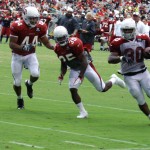 Running back Stepfan Taylor turns the corner during the Cardinals' Red & White Practice Saturday, August 3 at University of Phoenix Stadium in Glendale. (Adam Green/Arizona Sports)